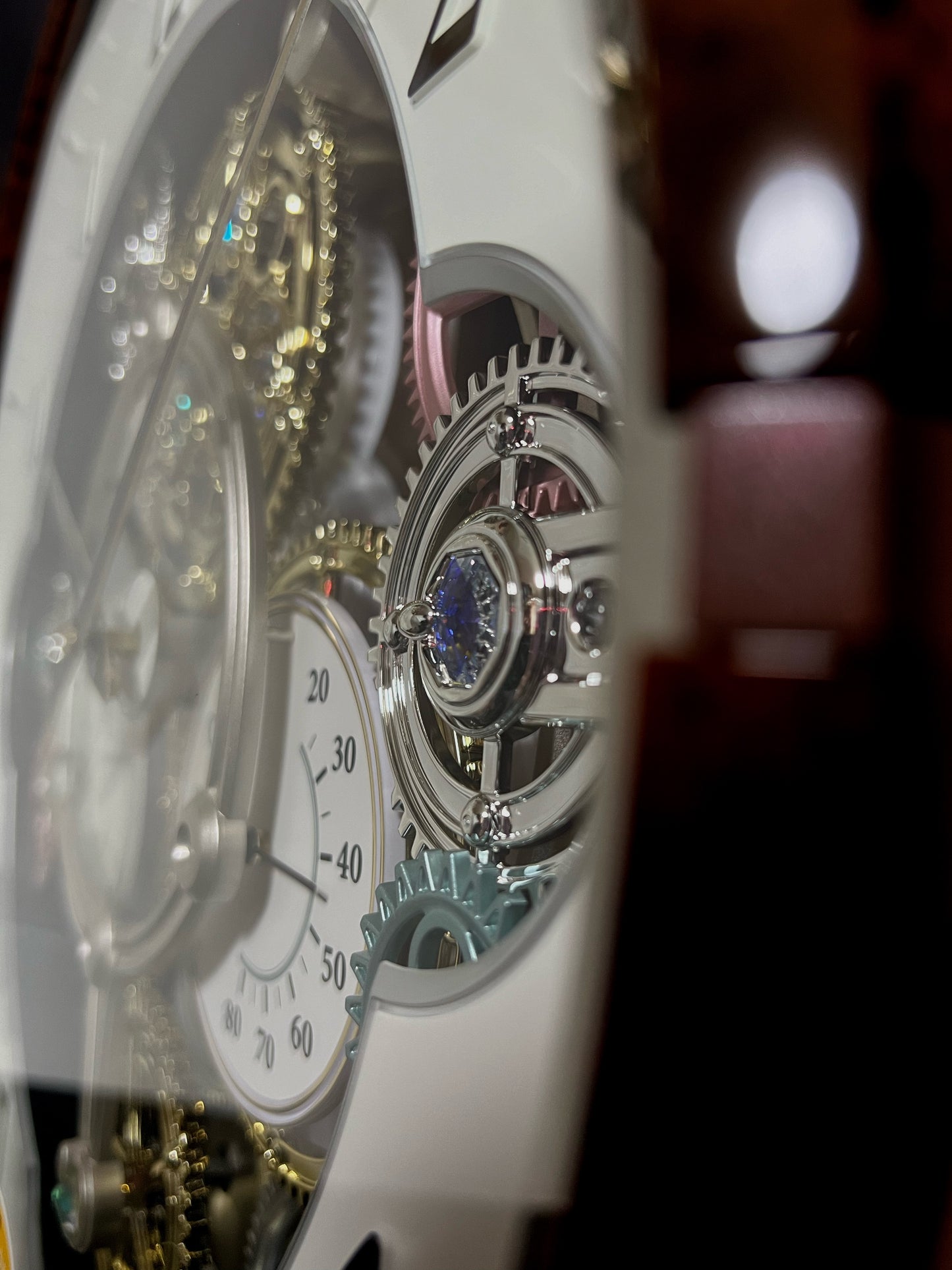 Rhythm “Widget (Woodgrain)” Skeletonized Dial Magic Motion Musical Wall Clock with Moving Gears - 4MH886WU23