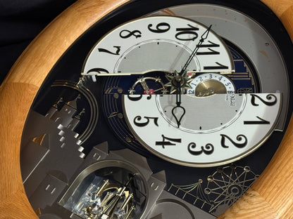 Rhythm "Timecracker Golden Oak" Moving Dial Magic Motion Musical Wooden Wall Clock with Popular Melodies - 4MH782-R07
