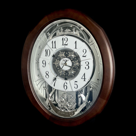 Rhythm "Anthology Espresso" Magic Motion Musical Wooden Wall Clock with Moving Dial - 4MH869WU06