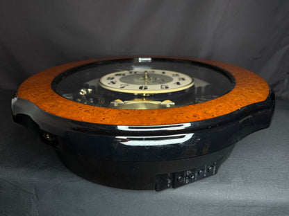 Rhythm “DWS Timecracker” Moving Dial Magic Motion Musical Wooden Wall Clock with Popular Melodies - 4MH752-R06