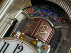 Seiko QXM123BRH "Broadway Showtunes Dropping Dial" Melodies in Motion Musical Moving Wall Clock with Popular Melodies