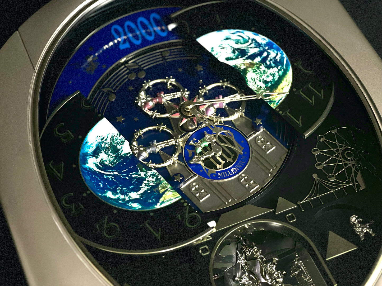 Rhythm “Timecracker 2000” Limited Edition Moving Earth Dial Magic Motion Musical Wall Clock with Popular Melodies - 4MH751NR19