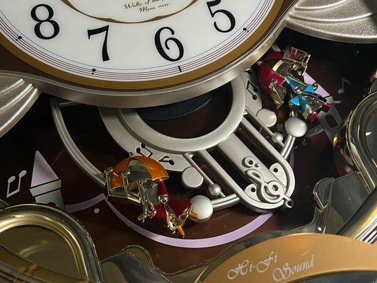 Seiko QXM118BRH "Umbrella Dance" Melodies in Motion Musical Decorative Pendulum Wall Clock