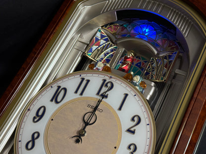 Seiko QXM223BRH "Classic Dropping Dial" Melodies in Motion Musical Moving Wall Clock