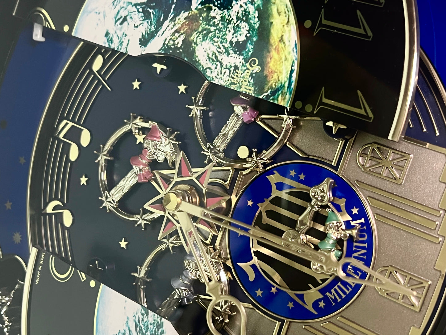Rhythm “Timecracker 2000” Limited Edition Moving Earth Dial Magic Motion Musical Wall Clock with Popular Melodies - 4MH751NR19