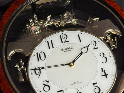 Rhythm "DWS Cinderella" Musical Motion Decorative Pendulum Wall Clock with Popular Melodies - 4MH762WR23