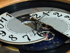 Rhythm "Timecracker Golden Oak" Moving Dial Magic Motion Musical Wooden Wall Clock with Popular Melodies - 4MH782-R07