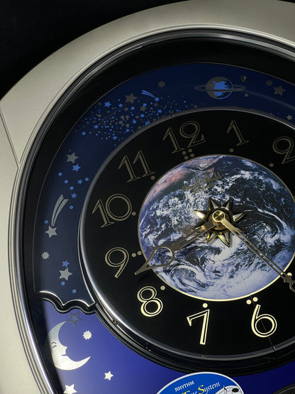 Rhythm “Peaceful Cosmos II” Moving Earth Dial Magic Motion Musical Wall Clock - 4MH408WU19