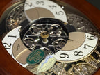Rhythm "CTS Nostalgia" Moving Dial Magic Motion Musical Wooden Wall Clock with Popular Melodies - 4MH780-R06