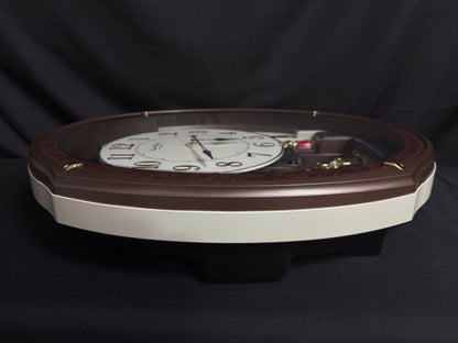 Rhythm "Harmony Blessing" Moving Dial Magic Motion Musical Wall Clock - 4MH423WR23