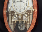 Rhythm “CTS Florence” Inlaid Wooden Musical Motion Pendulum Wall Clock with Popular Melodies - CMJ338UR06