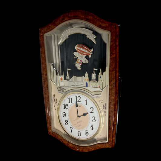 Seiko QXM135BRH "Lover’s Castle" Melodies in Motion Musical Moving Wall Clock with Popular Melodies