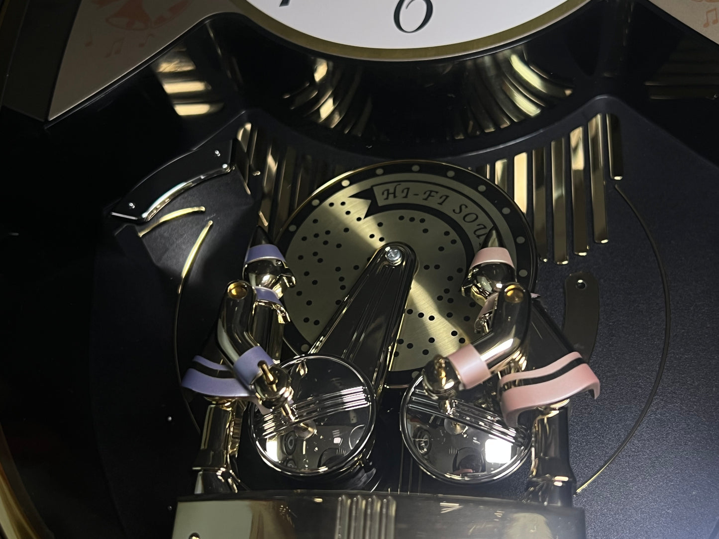 Seiko QXM124GRH "Music Disc Figurines" Melodies in Motion Musical Moving Wall Clock with Popular Music