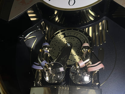Seiko QXM124GRH "Music Disc Figurines" Melodies in Motion Musical Moving Wall Clock with Popular Music