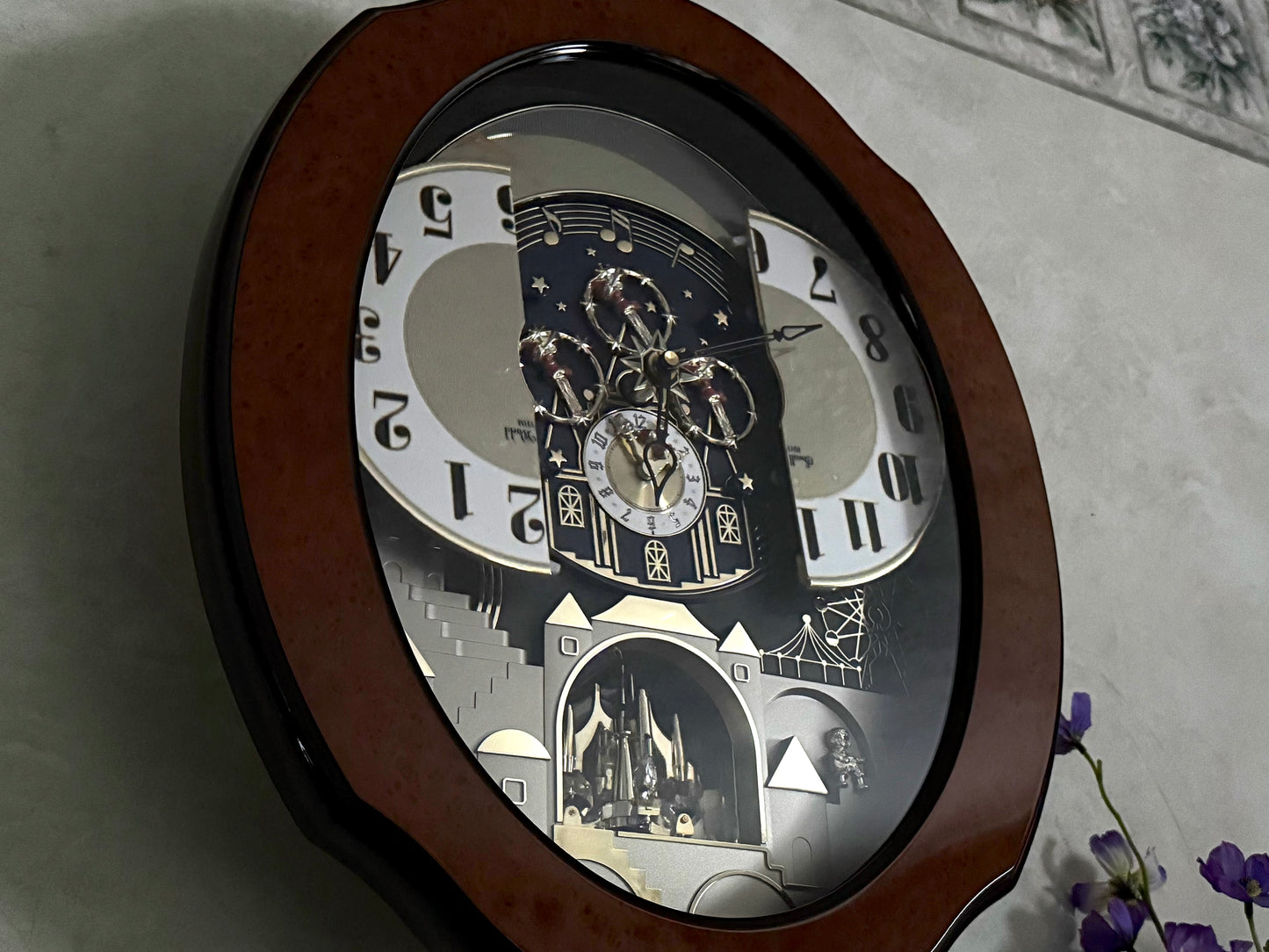 Rhythm “DWS Timecracker” Moving Dial Magic Motion Musical Wooden Wall Clock with Popular Melodies - 4MH752-R06