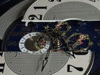 Rhythm “DWS Timecracker” Moving Dial Magic Motion Musical Wooden Wall Clock with Popular Melodies - 4MH752-R06
