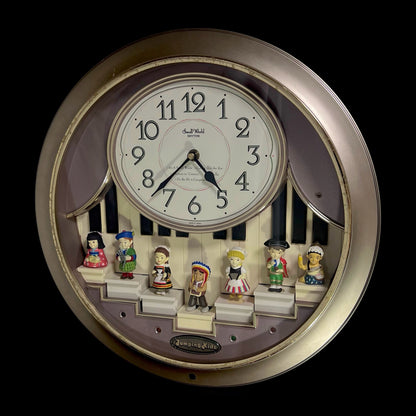 Rhythm “Jumping Kids” Magic Motion Musical Wall Clock with Moving Figurines and Piano Keys - 4MH721RH18