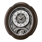 Seiko QXM609NRH “Opera” Melodies in Motion Dancing Dial Musical Wooden Wall Clock with 36 Songs