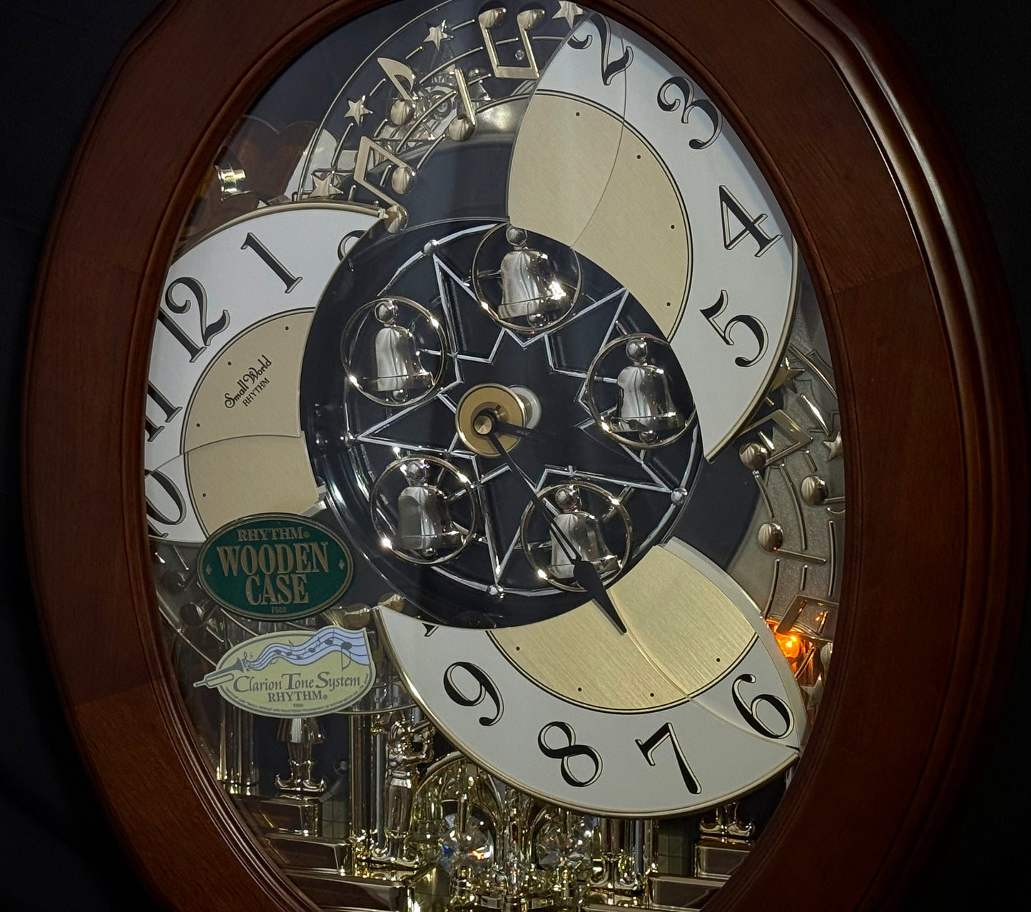 Rhythm "CTS Nostalgia" Moving Dial Magic Motion Musical Wooden Wall Clock with Popular Melodies - 4MH780-R06