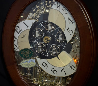 Rhythm "CTS Nostalgia" Moving Dial Magic Motion Musical Wooden Wall Clock with Popular Melodies - 4MH780-R06