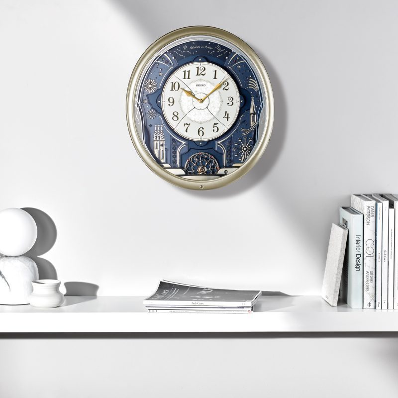 Seiko QXM239SRH "Celebration" Melodies in Motion Musical Wall Clock with Animated Moving Dial & 6 Songs