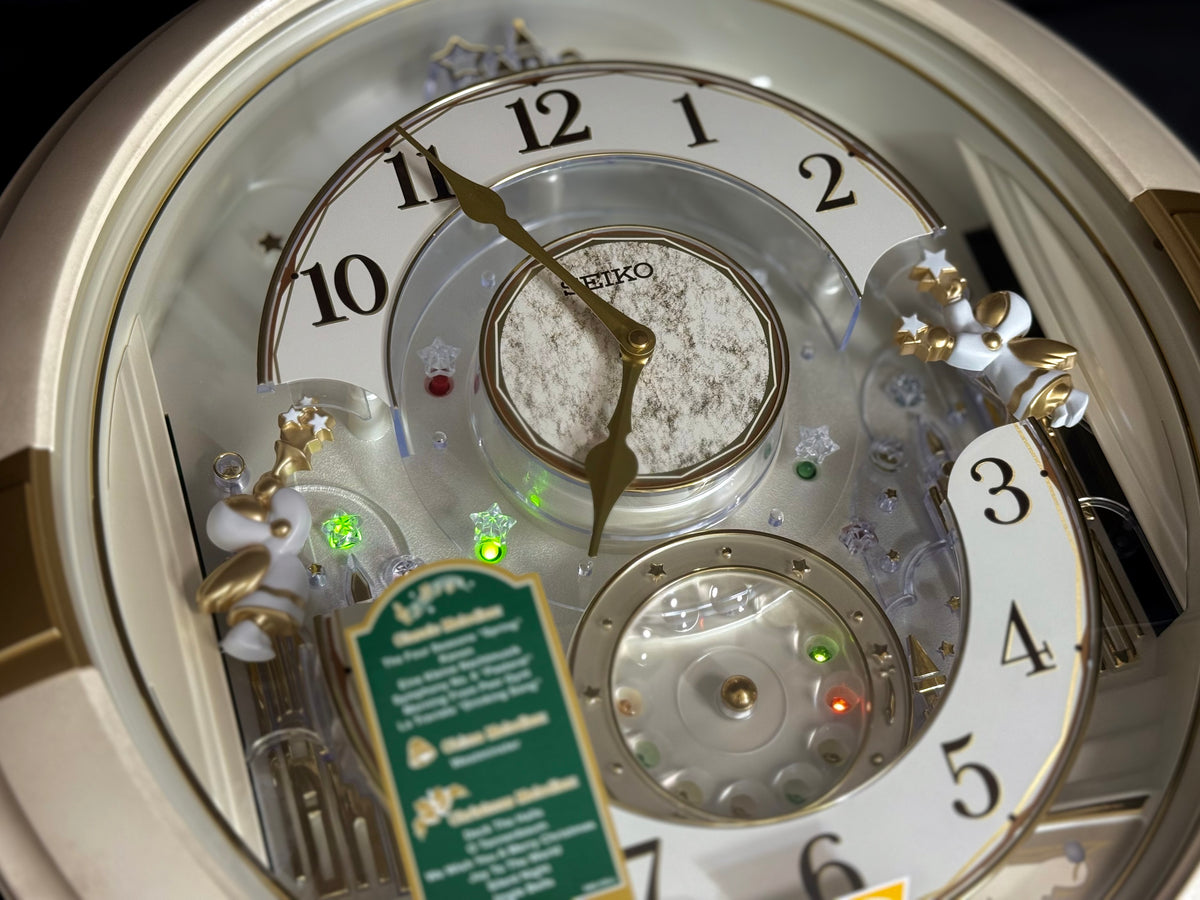 Seiko QXM603WRH “Winter Angels” Melodies in Motion Jaw-Dropping Dial Musical Moving Wall Clock with 13 Songs