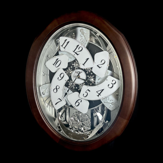 Rhythm "Anthology Espresso" Magic Motion Musical Wooden Wall Clock with Moving Dial - 4MH869WU06