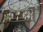 Rhythm “CTS Florence” Inlaid Wooden Musical Motion Pendulum Wall Clock with Popular Melodies - CMJ338UR06