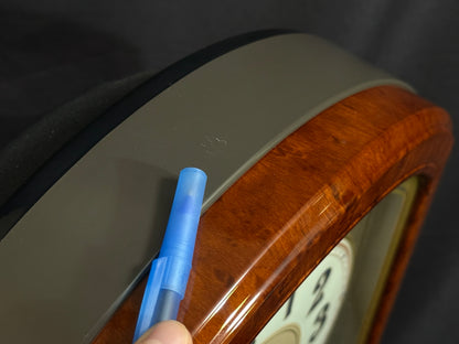 Seiko QXM123BRH "Broadway Showtunes Dropping Dial" Melodies in Motion Musical Moving Wall Clock with Popular Melodies