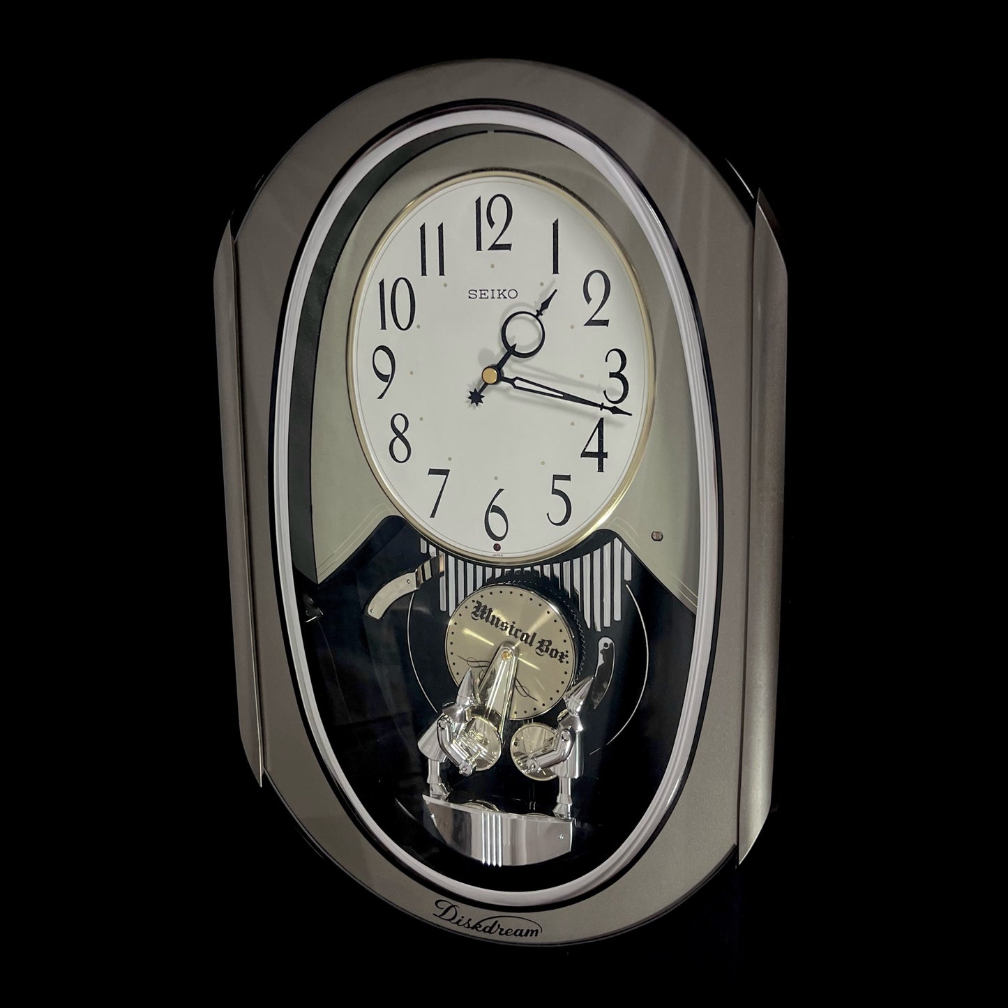 Seiko RE528S "Diskdream Music Box" Musical Motion Wall Clock from Japan with Moving Figurines