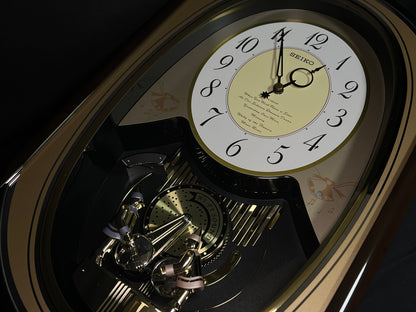 Seiko QXM124GRH "Music Disc Figurines" Melodies in Motion Musical Moving Wall Clock with Popular Music