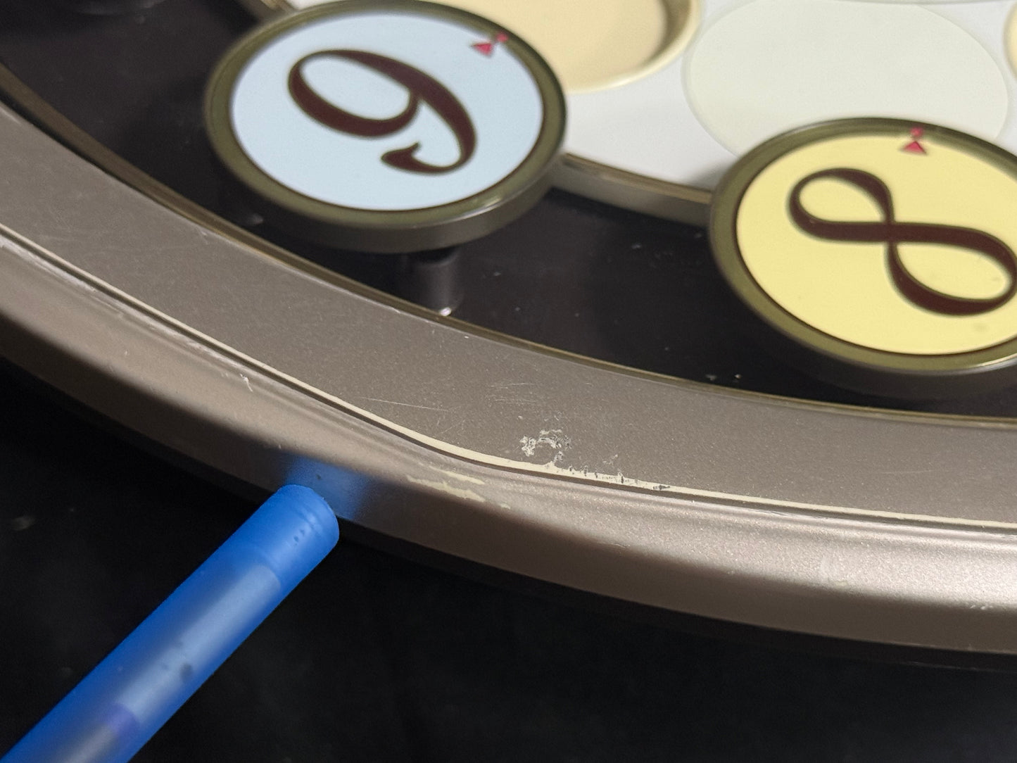 Seiko QXM106SRH "Twirling Numbers" Melodies in Motion Musical Wall Clock with Moving Dial