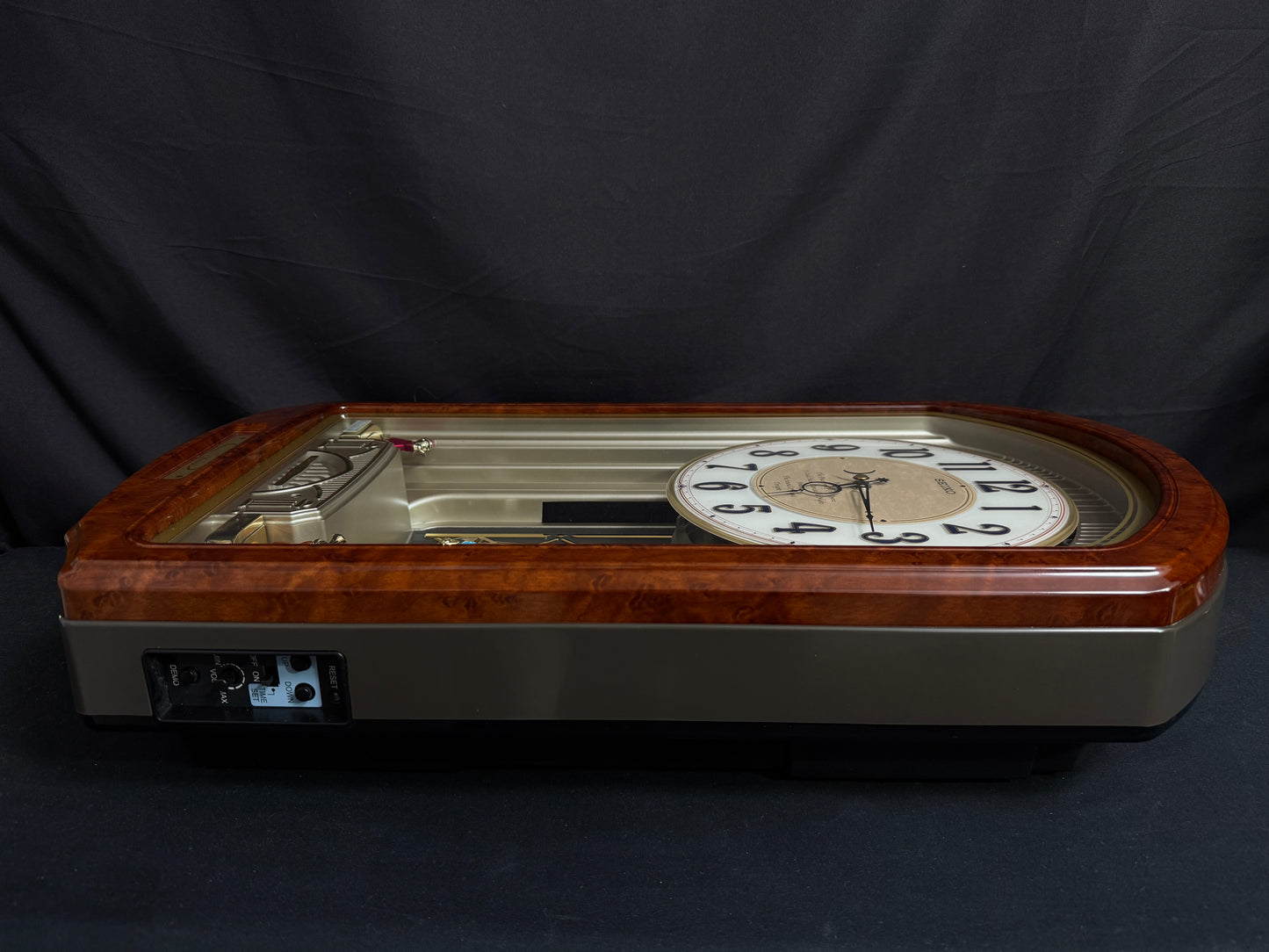 Seiko QXM123BRH "Broadway Showtunes Dropping Dial" Melodies in Motion Musical Moving Wall Clock with Popular Melodies