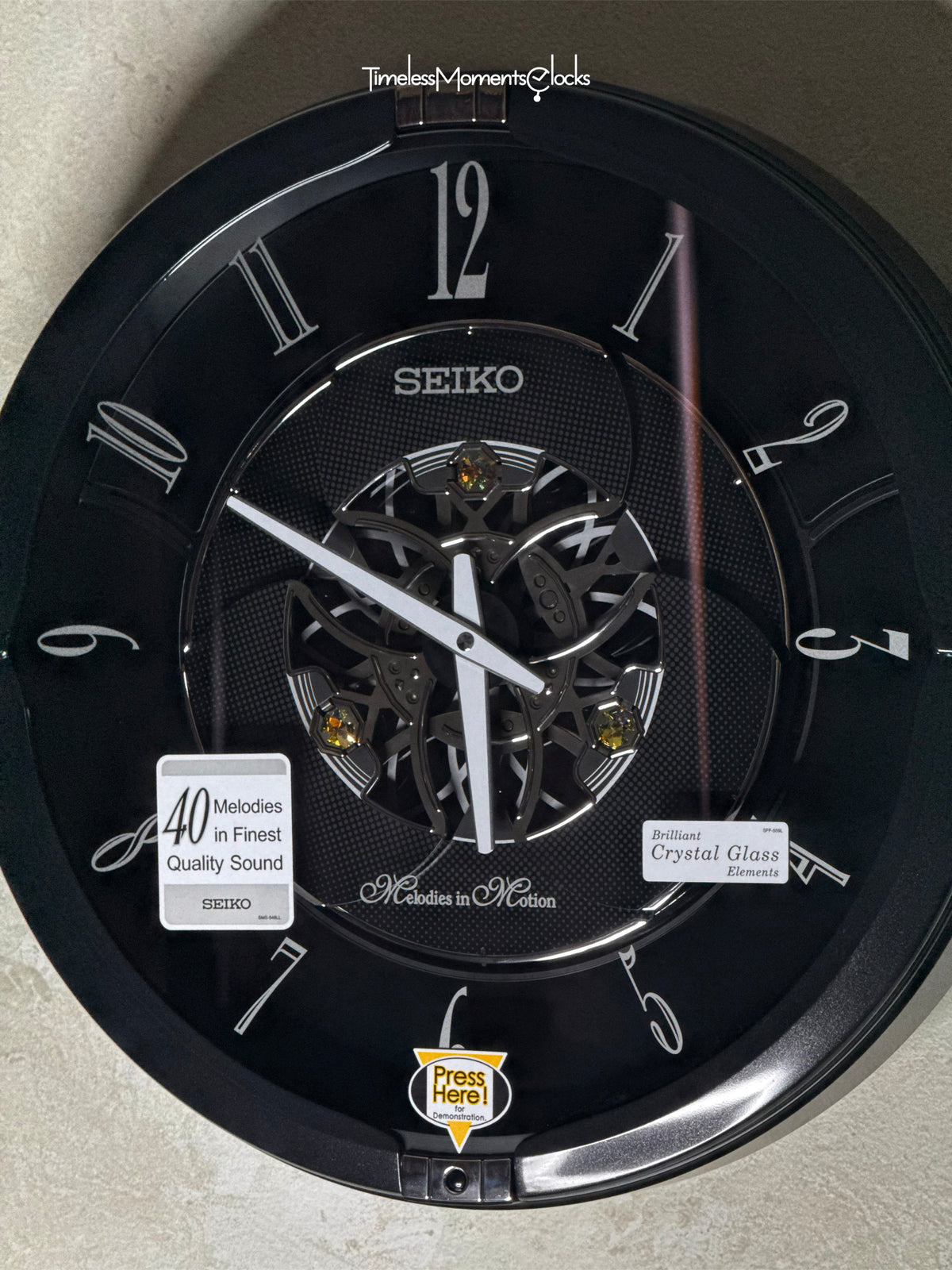 Seiko QXM621KRH “Onyx” Melodies in Motion Dancing Dial Musical Wall Clock with 40 Songs