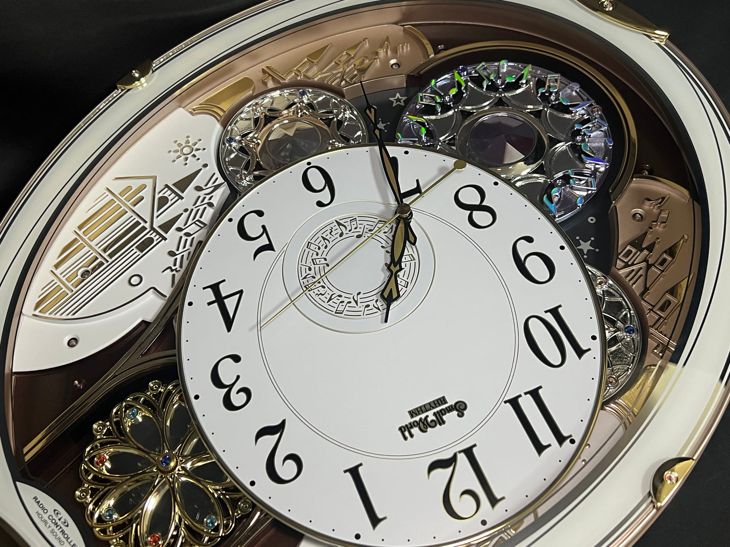 Rhythm "Small World Noel (White)" Magic Motion Musical Wall Clock from Japan with Rotating Dial - 4MN509RH03