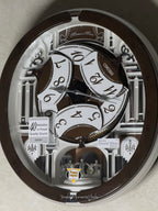 Seiko QXM615BRH “Snow Castle” Melodies in Motion Dancing Dial Musical Wall Clock with 40 Songs