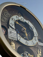 Seiko QXM620GRH "Golden Festival" Melodies in Motion Dancing Dial Musical Wall Clock with 30 Songs