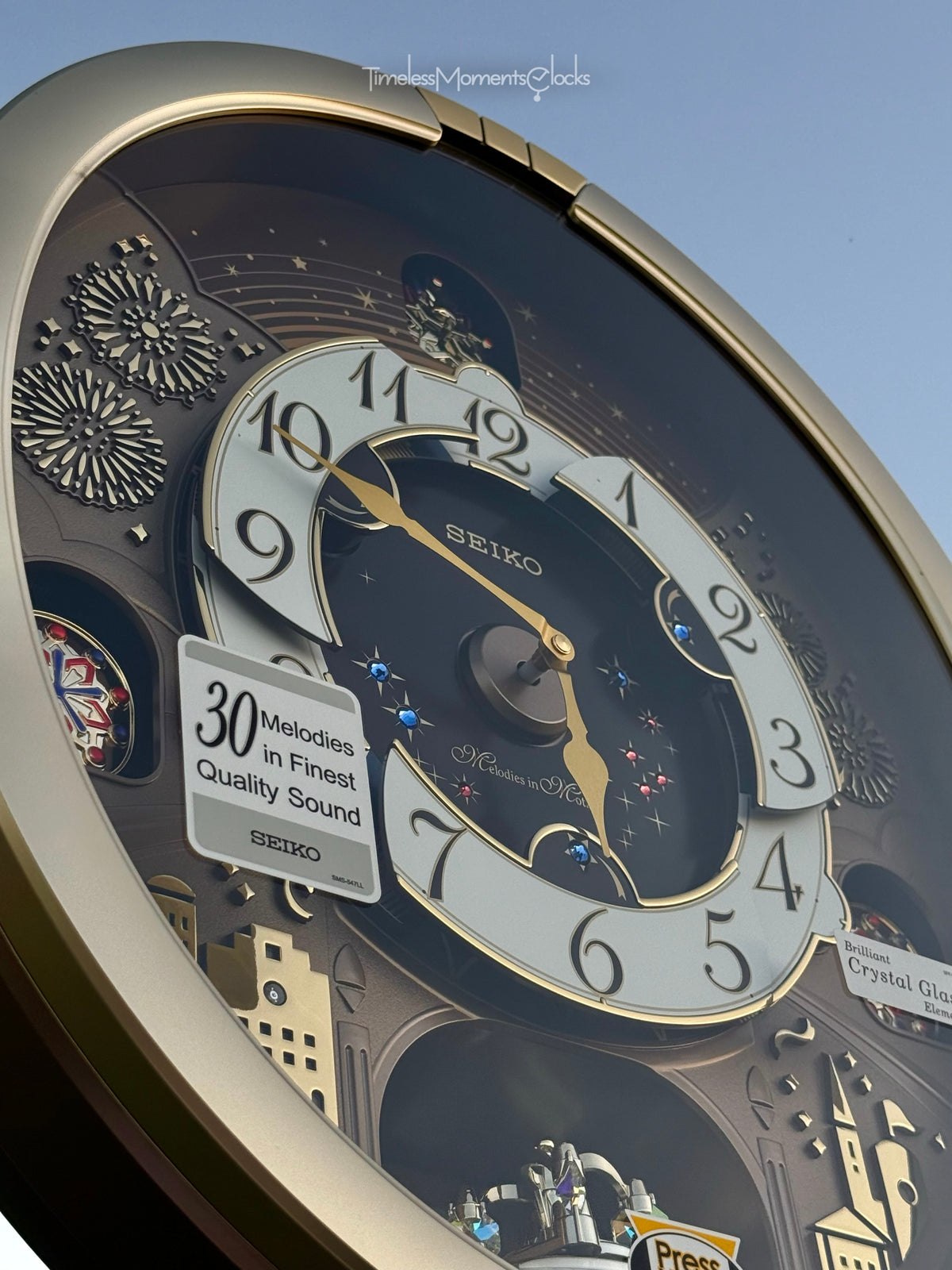Seiko QXM620GRH "Golden Festival" Melodies in Motion Dancing Dial Musical Wall Clock with 30 Songs