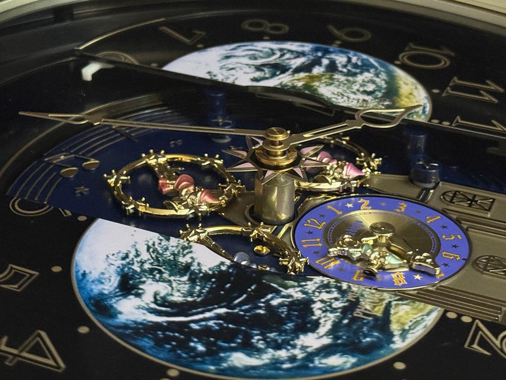Rhythm “Peaceful Cosmos Entertainer” Moving Earth Dial Magic Motion Musical Wall Clock with Popular Melodies - 4MH839WB19