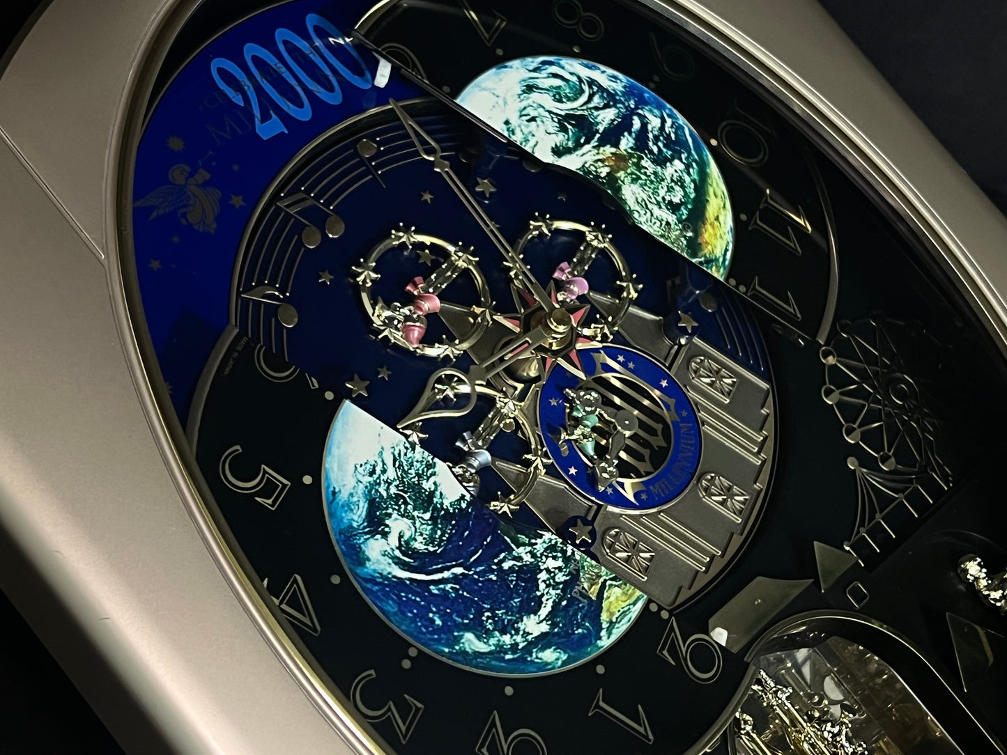Rhythm “Timecracker 2000” Limited Edition Moving Earth Dial Magic Motion Musical Wall Clock with Popular Melodies - 4MH751NR19