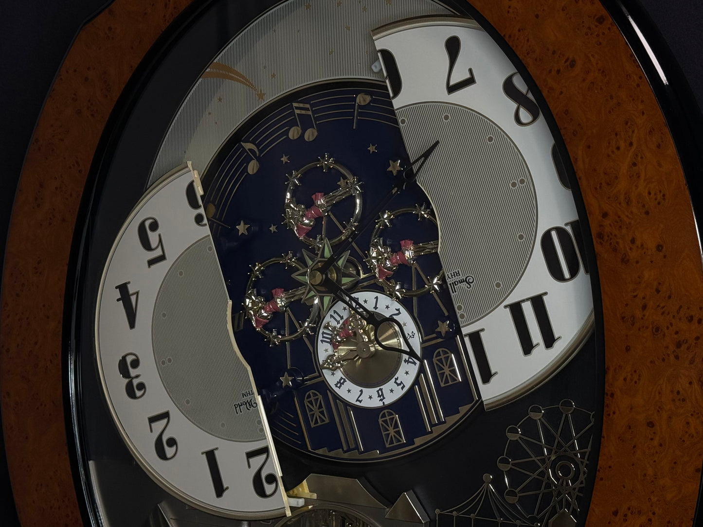 Rhythm “DWS Timecracker” Moving Dial Magic Motion Musical Wooden Wall Clock with Popular Melodies - 4MH752-R06