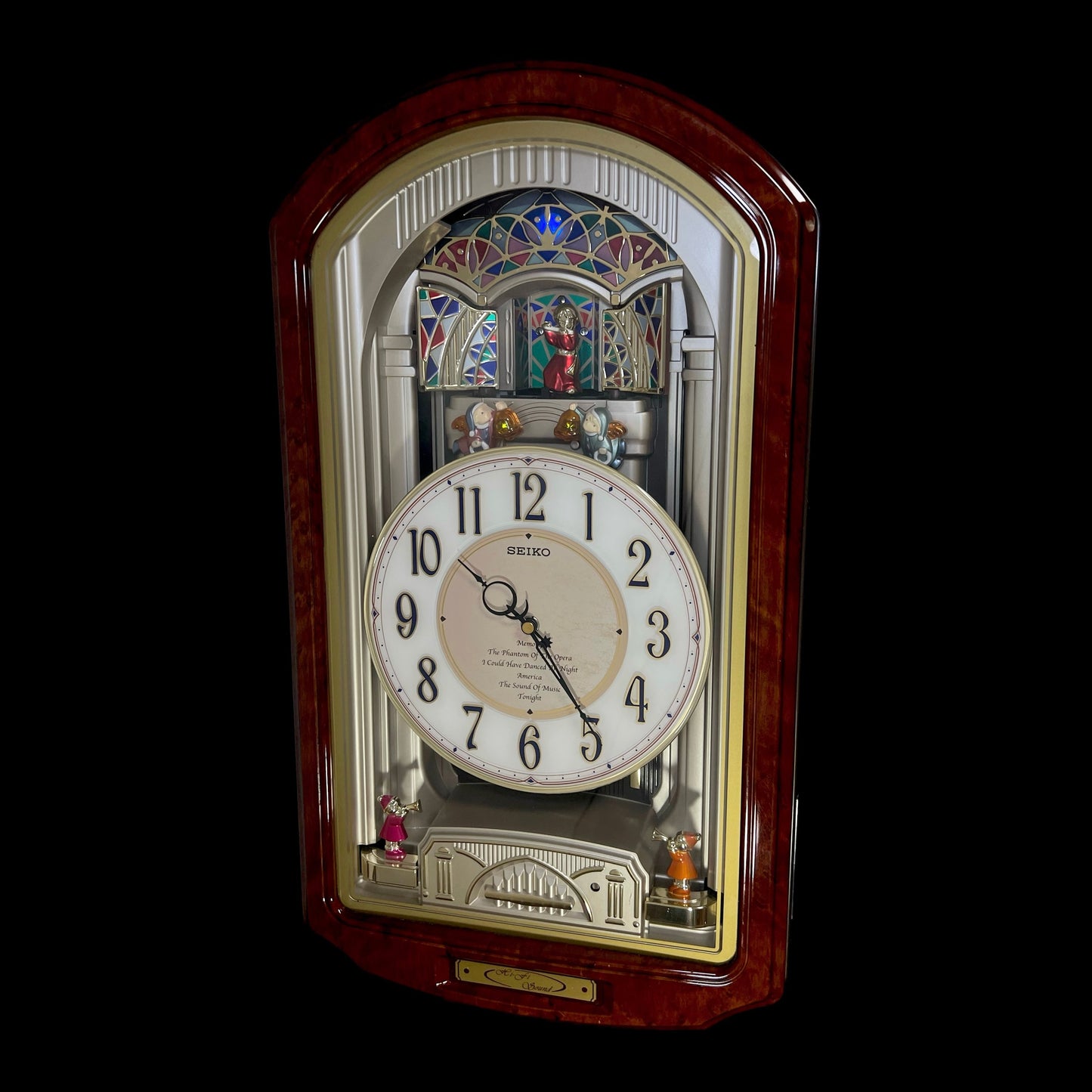 Seiko QXM123BRH "Broadway Showtunes Dropping Dial" Melodies in Motion Musical Moving Wall Clock with Popular Melodies