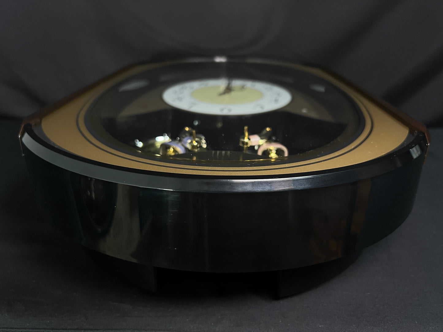 Seiko QXM124GRH "Music Disc Figurines" Melodies in Motion Musical Moving Wall Clock with Popular Music