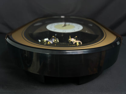 Seiko QXM124GRH "Music Disc Figurines" Melodies in Motion Musical Moving Wall Clock with Popular Music
