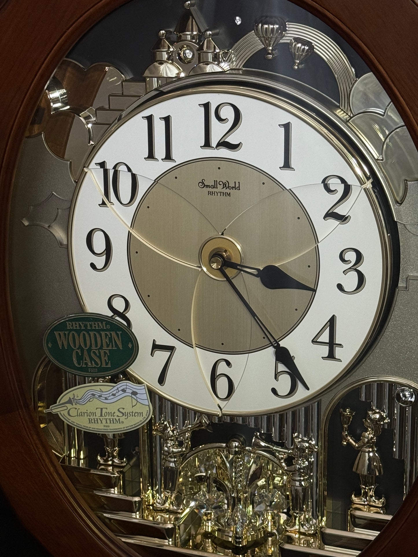 Rhythm "CTS Nostalgia" Moving Dial Magic Motion Musical Wooden Wall Clock with Popular Melodies - 4MH780-R06