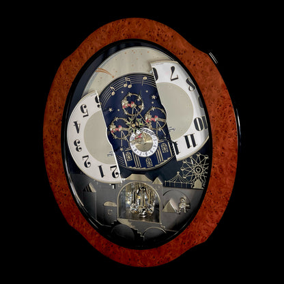 Rhythm “DWS Timecracker” Moving Dial Magic Motion Musical Wooden Wall Clock with Popular Melodies - 4MH752-R06