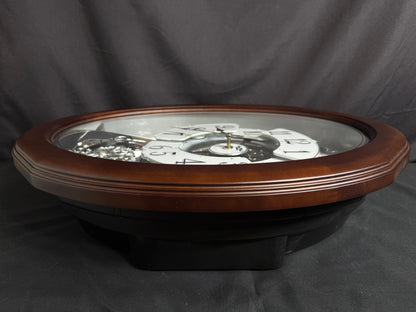 Rhythm "Anthology Espresso" Magic Motion Musical Wooden Wall Clock with Moving Dial - 4MH869WU06