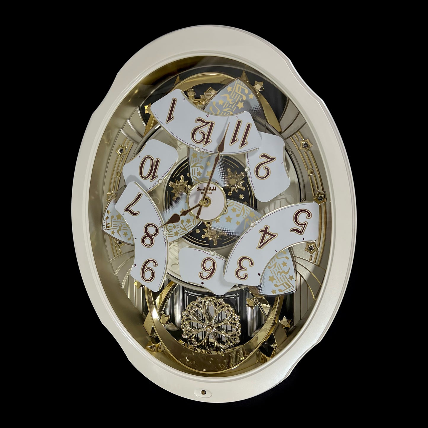Rhythm "Marvelous Pearl" Magic Motion Musical Wall Clock with Moving Dial - 4MH427WU03
