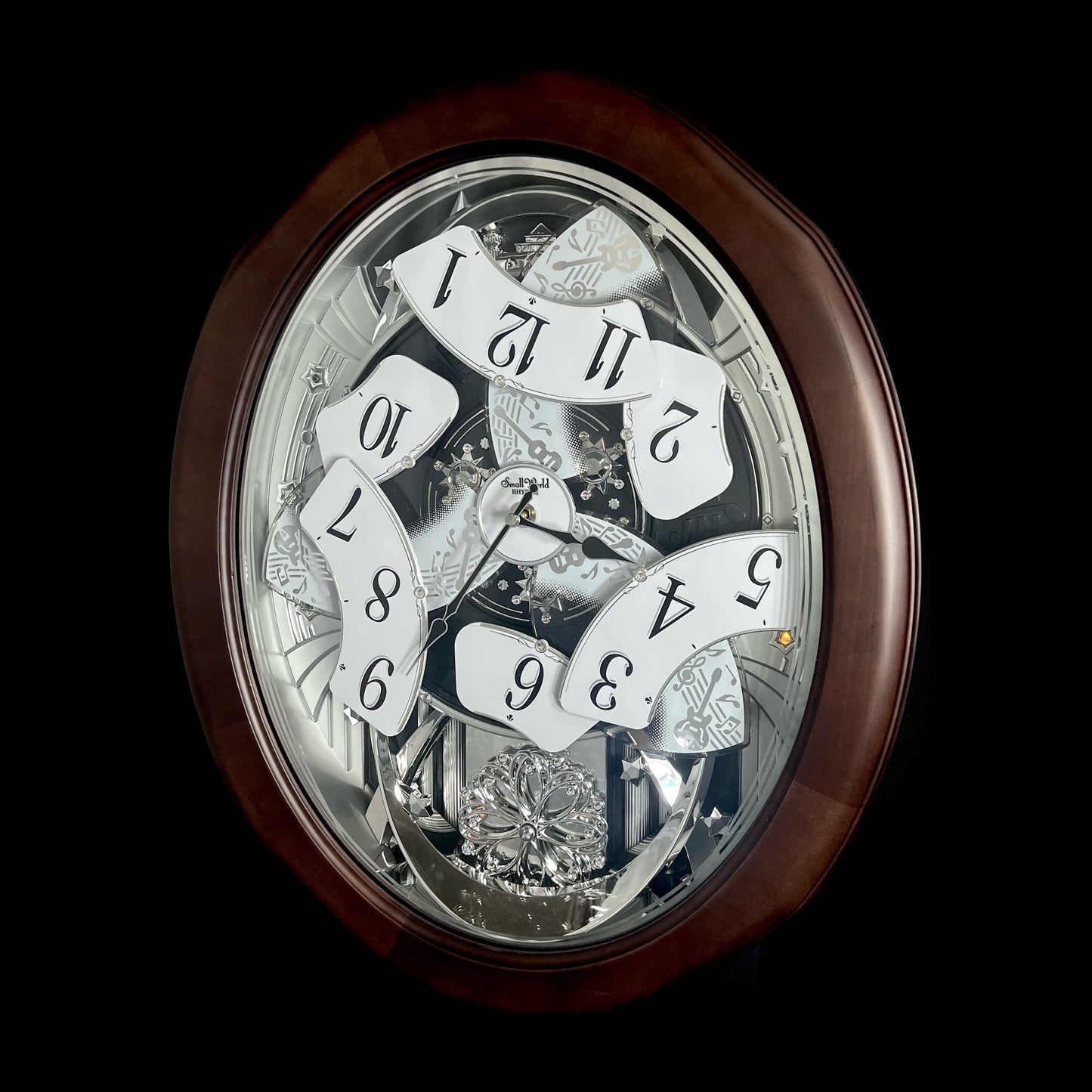 Rhythm "Anthology Espresso" Magic Motion Musical Wooden Wall Clock with Moving Dial - 4MH869WU06