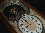 Seiko QXM135BRH "Lover’s Castle" Melodies in Motion Musical Moving Wall Clock with Popular Melodies